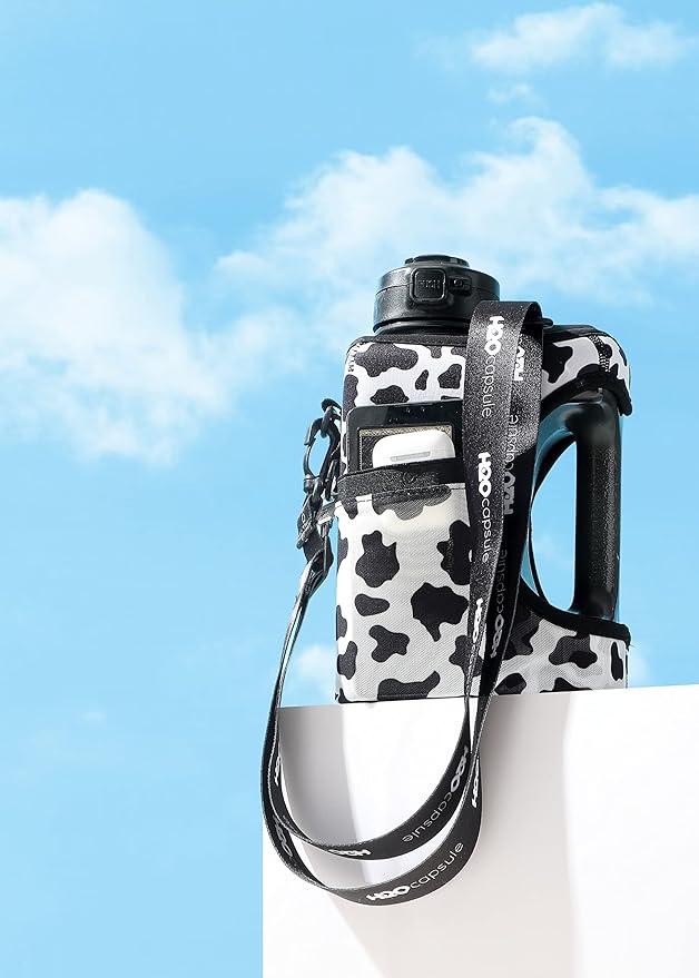 H2O Capsule Half Gallon Cube Square Water Bottle - 2.2L Water Bottle with Strap, Storage Sleeve, Covered Straw and Chug Lid – BPA Free Reusable Sports Water Jug with Handle, (68 Ounce), (Cow)